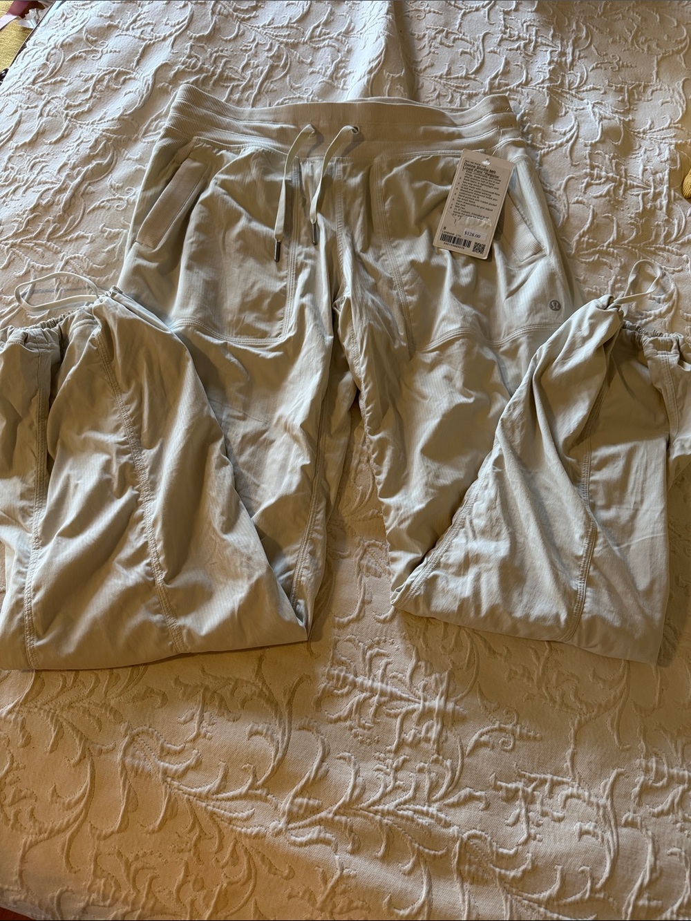 NWT lululemon athletica Light Cream Drawstring dance studio lined pants